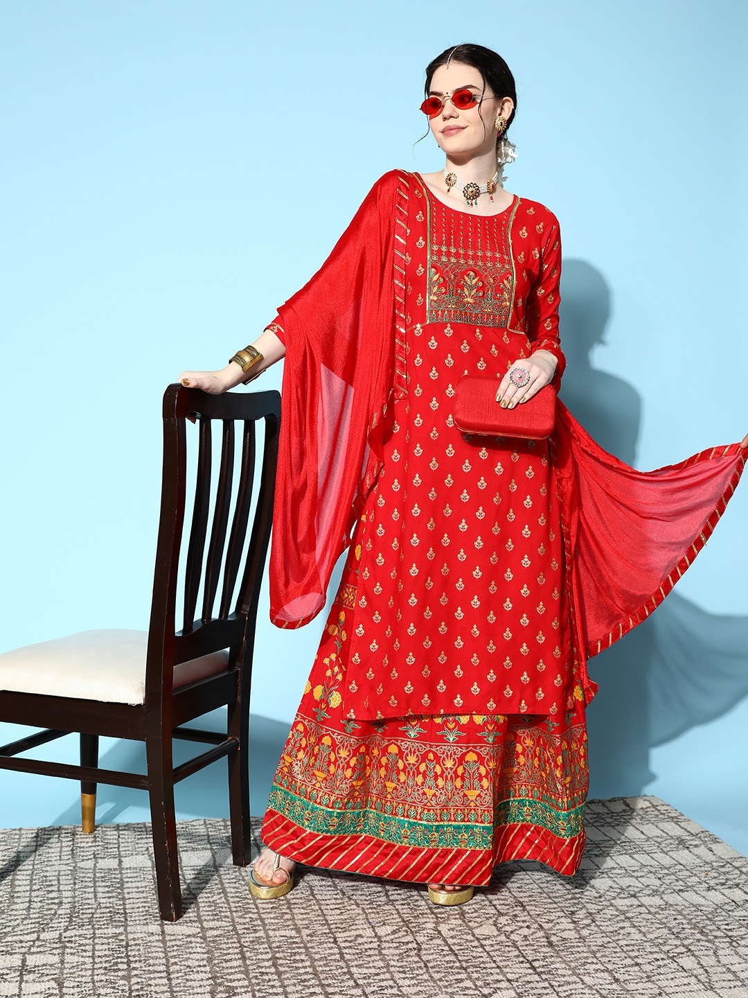 

SheWill Women Red & Golden Ethnic Motifs Printed Kurta with Skirt & With Dupatta
