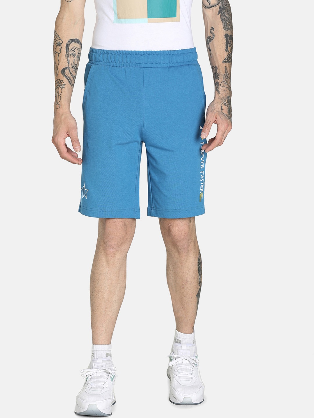 

Puma Men Solid Regular Fit Cotton Sports shorts, Blue