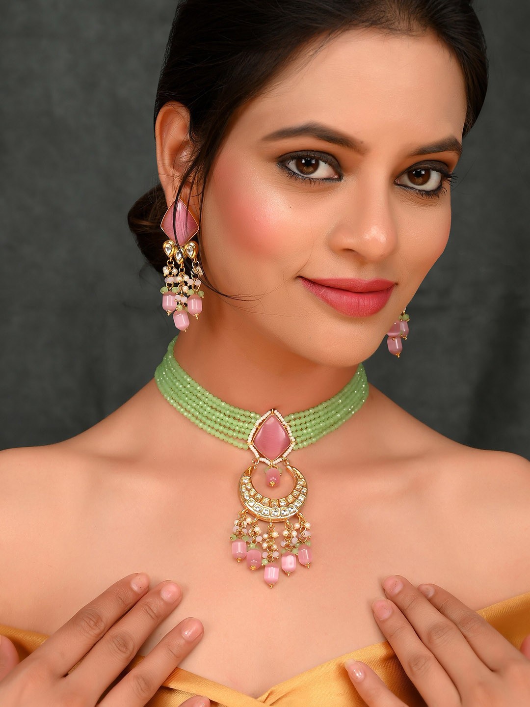 

DASTOOR Gold-Plated & Pink Kundan Stone-Studded & Green Beaded Jewellery Set