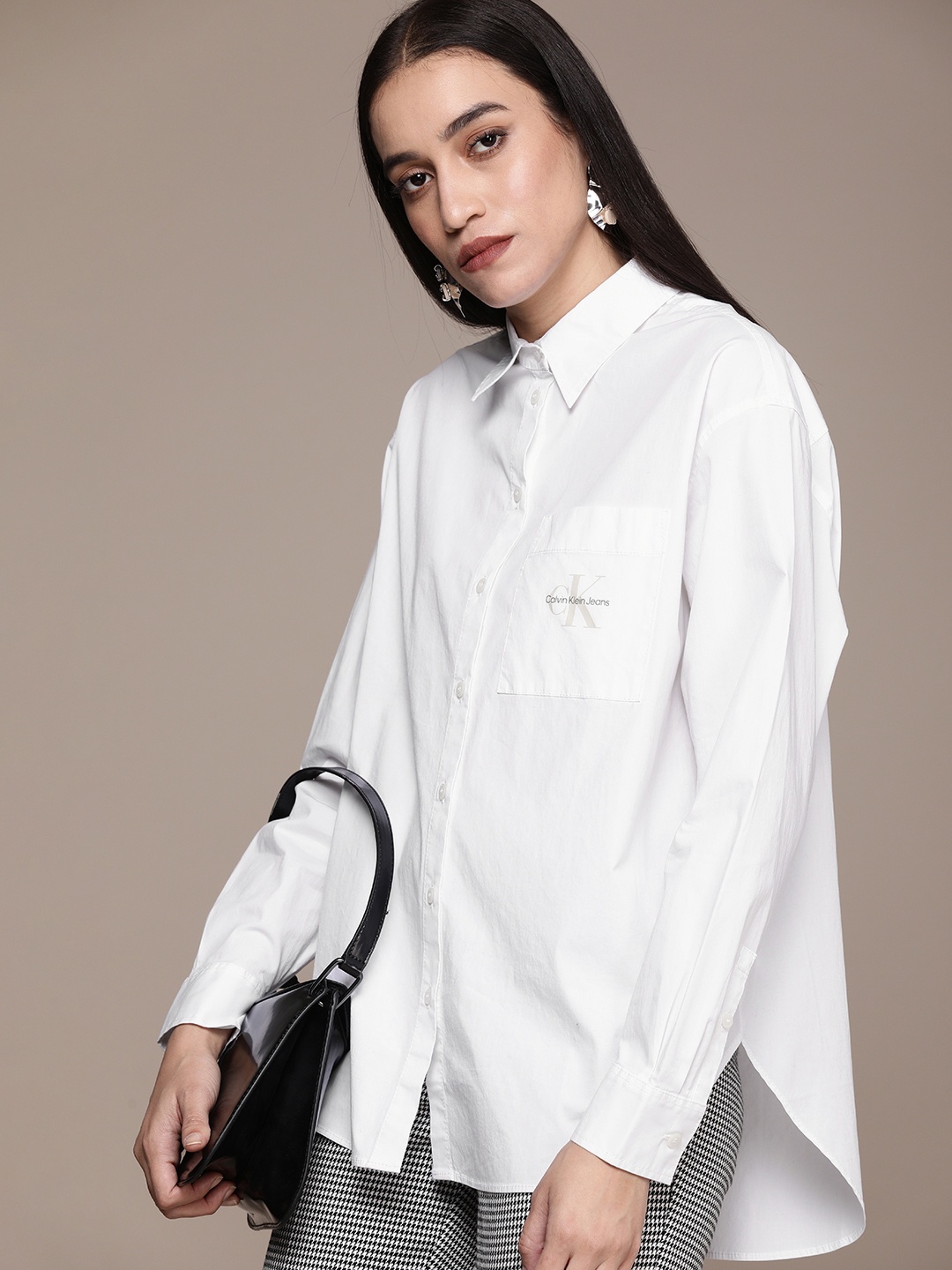 

Calvin Klein Jeans Women White Classic Solid Longline Casual Shirt