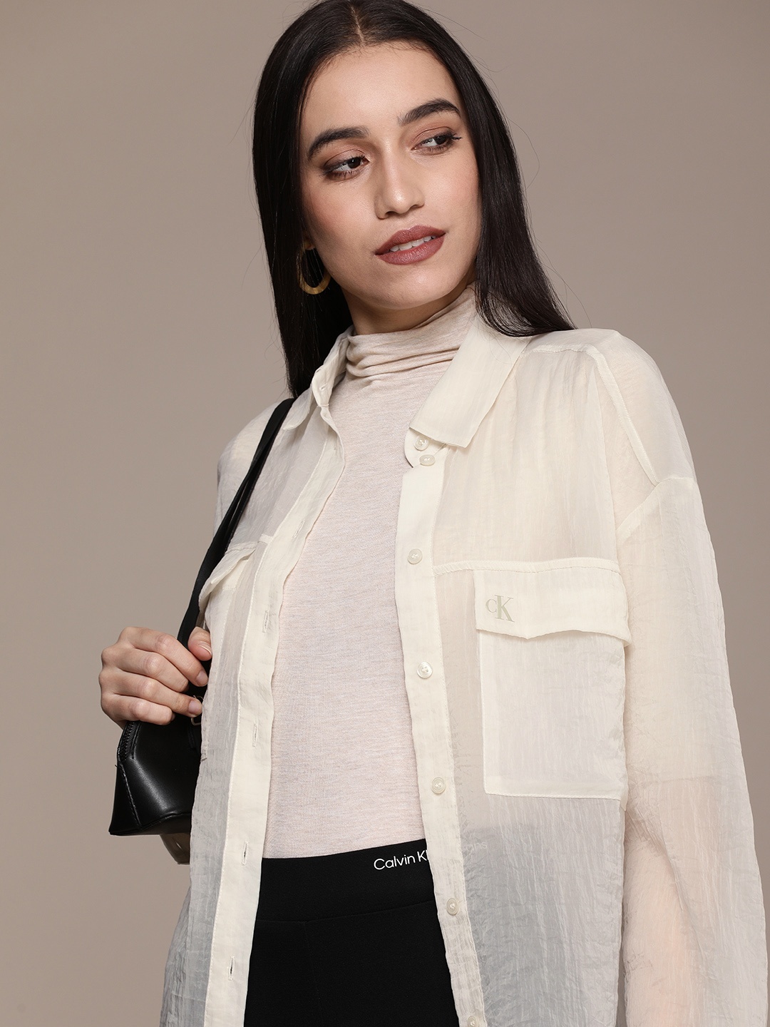 

Calvin Klein Jeans Women Beige Classic Solid Sheer Casual Shirt With Flap Pockets