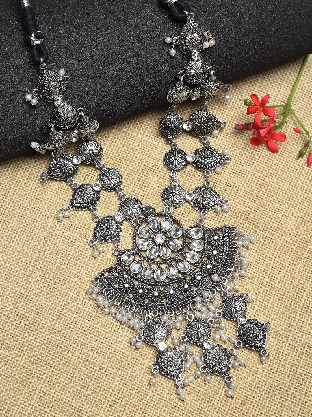 

Dhrohar Women Silver-Toned & White Rhodium-Plated Statement Necklace