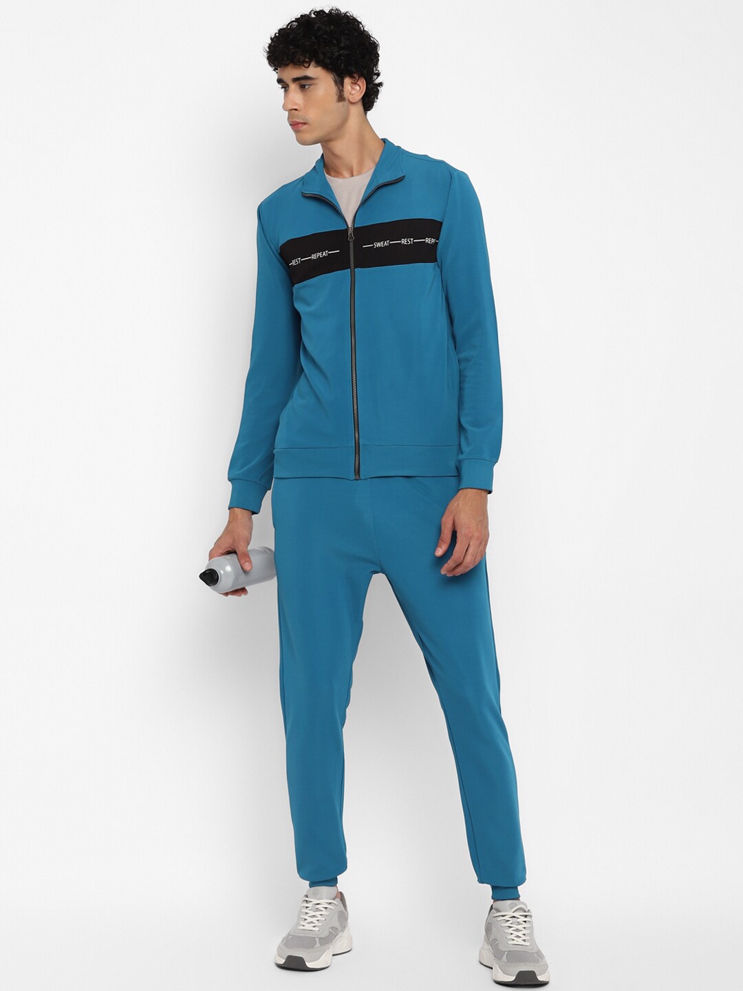 

Yuuki Men Blue Solid Tracksuits