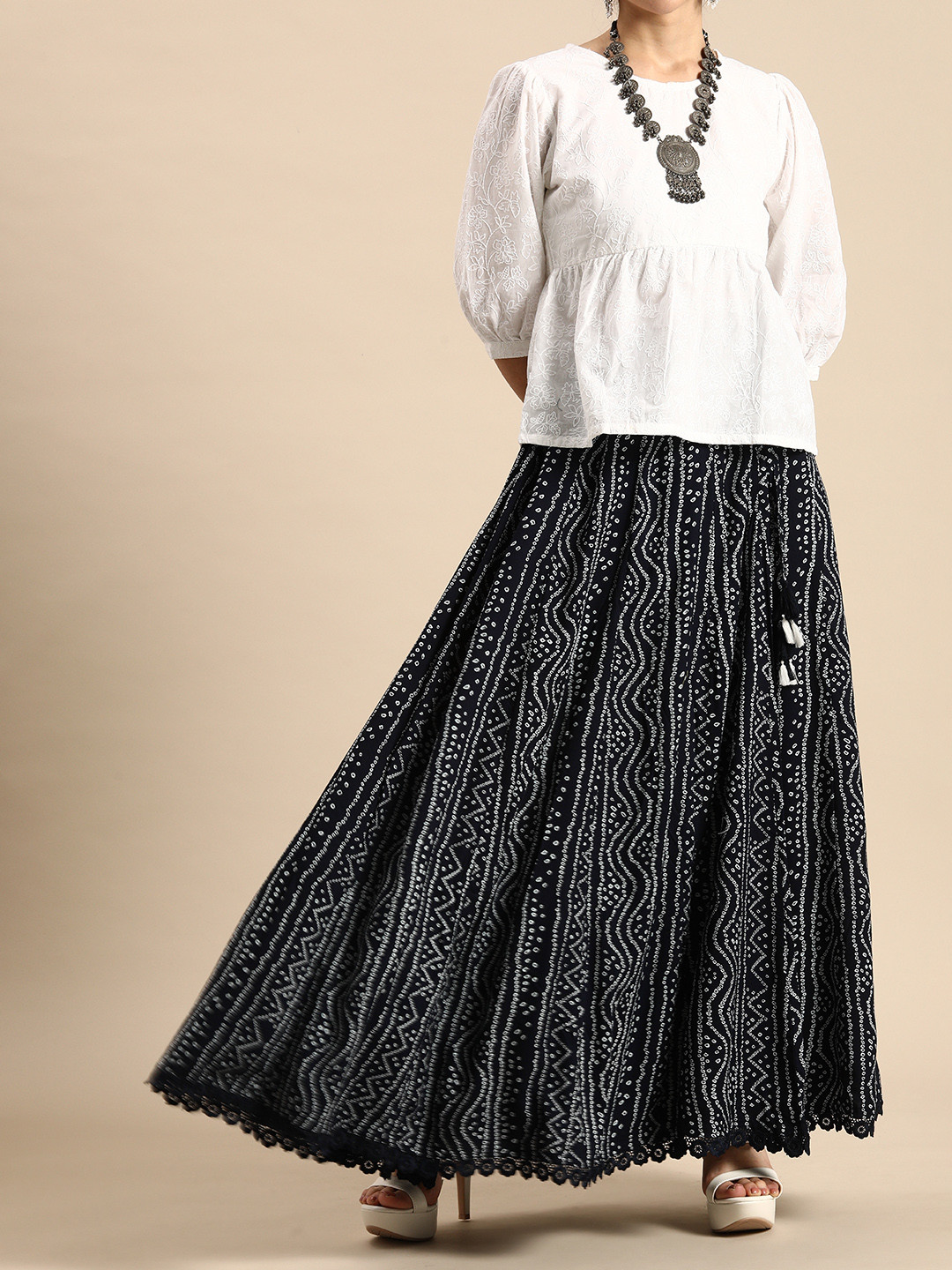 

Sangria Women Navy Blue Printed Flared Maxi Skirt
