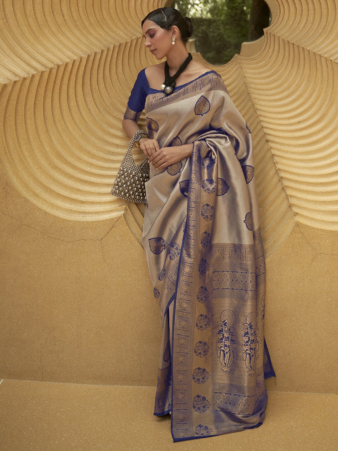 

Mitera Grey & Blue Ethnic Motifs Zari Banarasi Saree