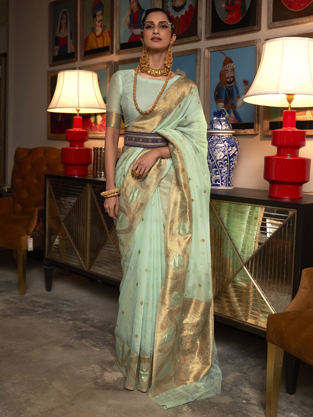 

Mitera Sea Green & Gold-Toned Ethnic Motifs Zari Silk Blend Banarasi Saree
