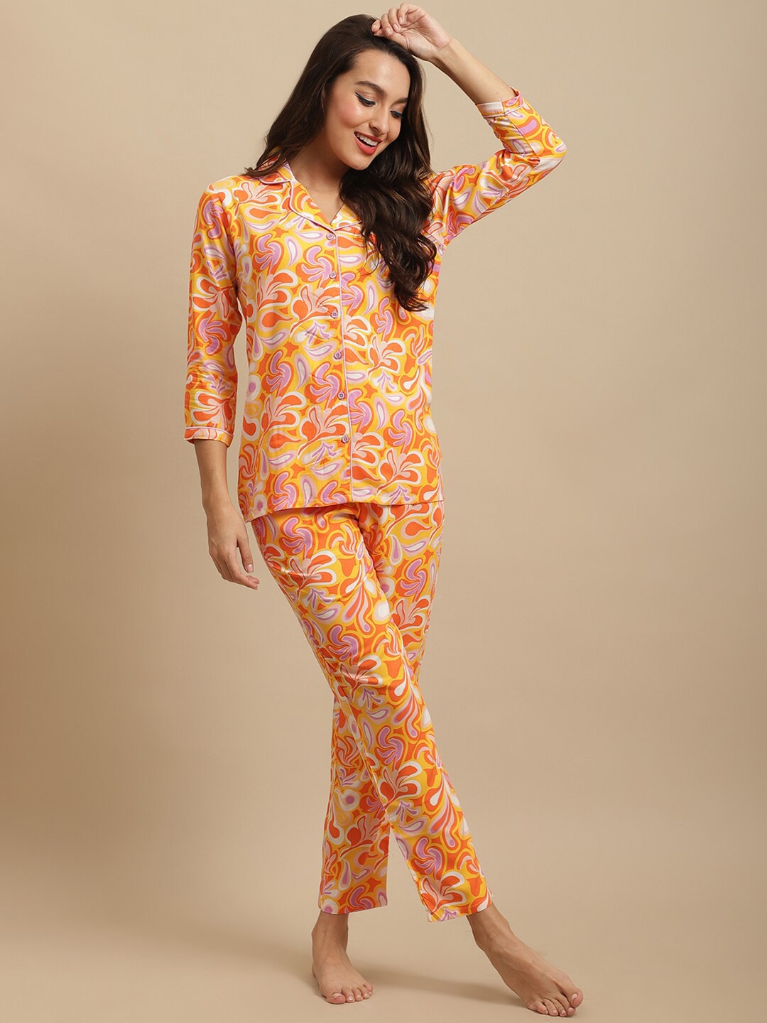 

Claura Women Orange Printed Nightsuit