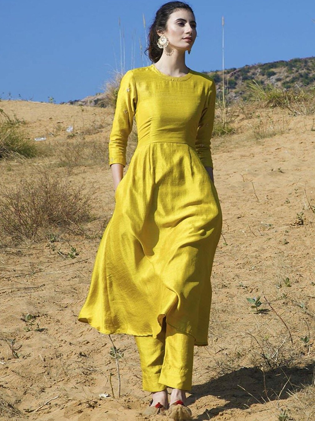 

Ambraee Women Yellow Solid Pleated Kurta with Trousers