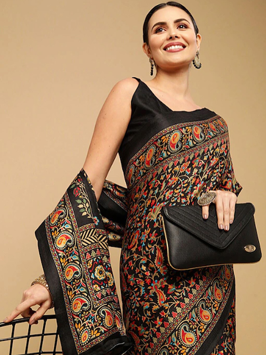 

Satrani Black & Orange Floral Printed Saree
