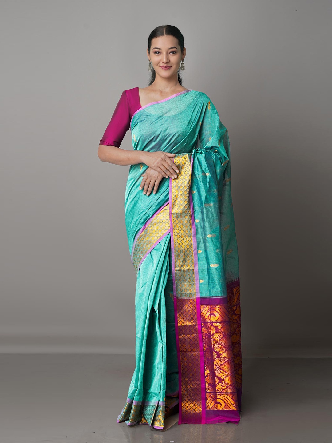 

Unnati Silks Green & Purple Ethnic Motifs Zari Pure Cotton Gadwal Saree
