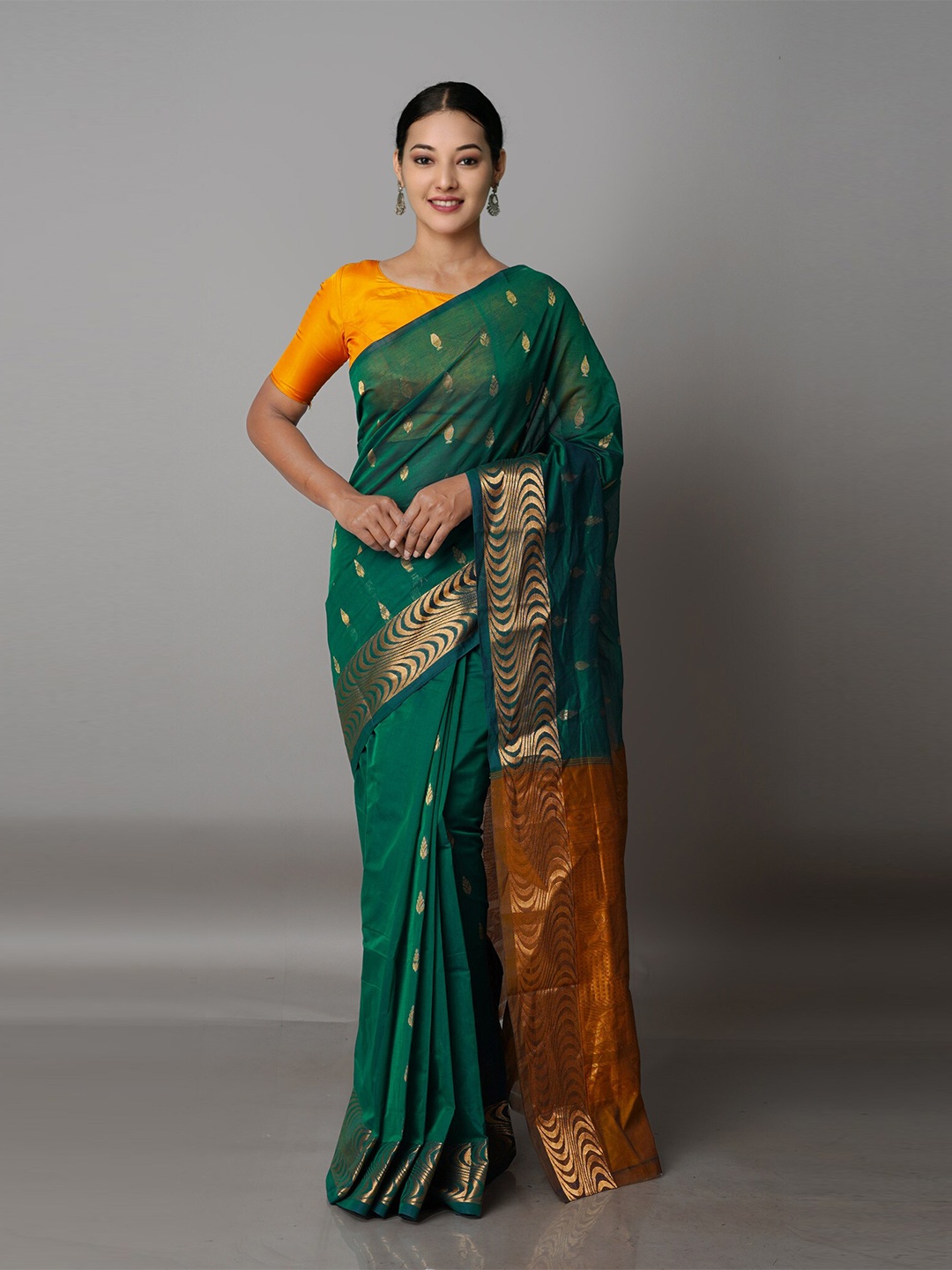 

Unnati Silks Green & Mustard Ethnic Motifs Zari Pure Cotton Gadwal Saree