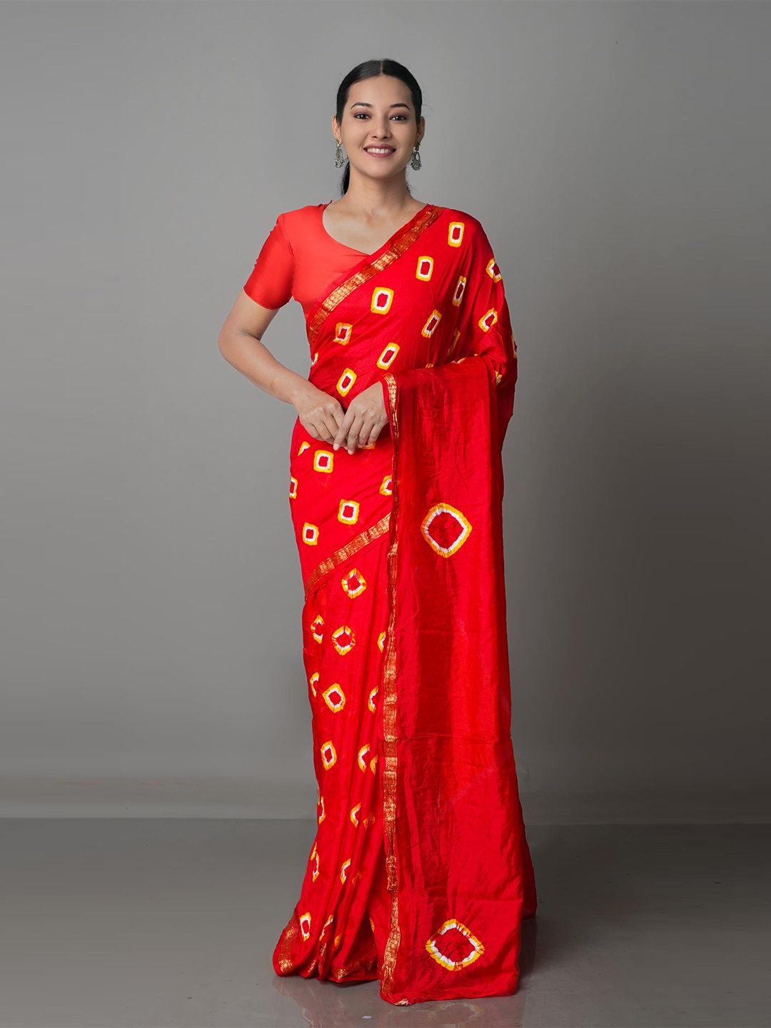 

Unnati Silks Red & Yellow Bandhani Zari Silk Saree