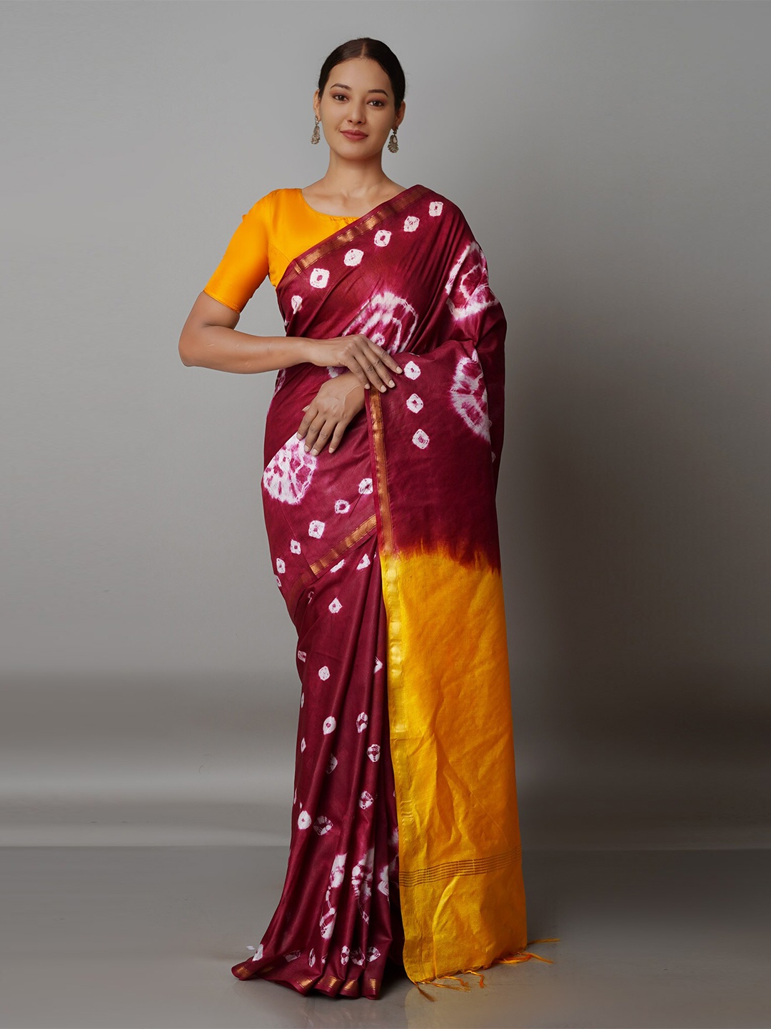 

Unnati Silks Maroon & Yellow Bandhani Zari Silk Cotton Chanderi Saree