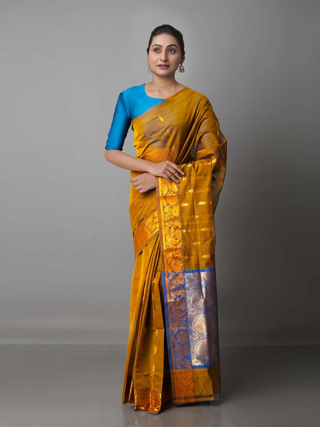 

Unnati Silks Brown & Blue Ethnic Motifs Zari Pure Cotton Gadwal Saree