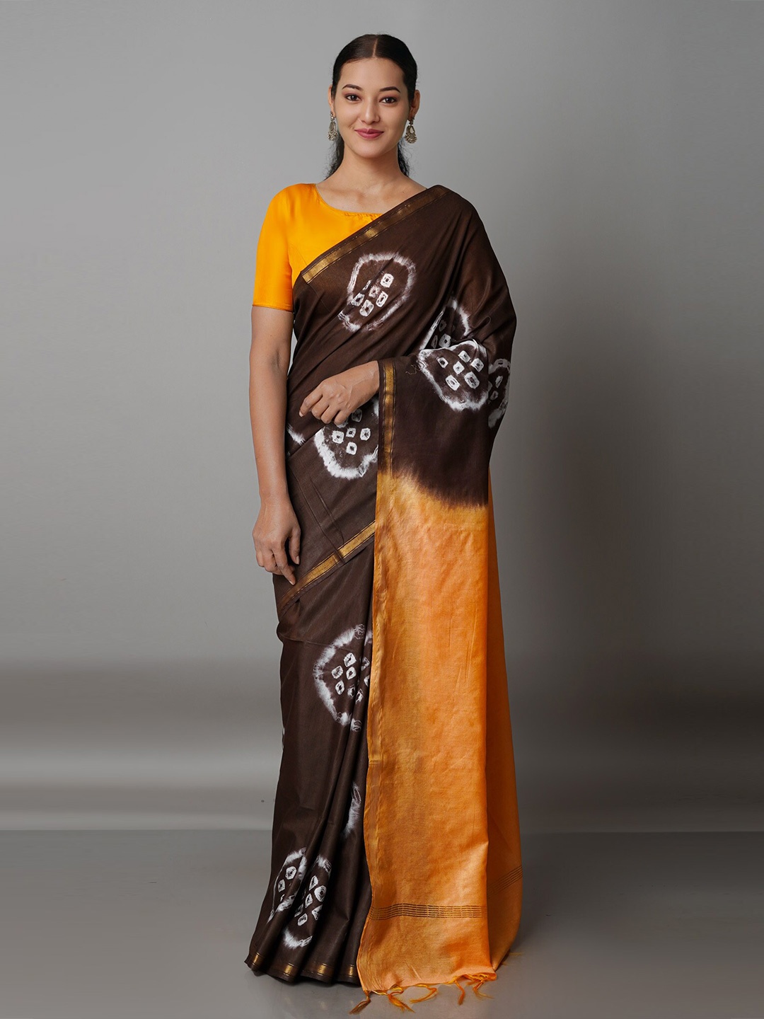 

Unnati Silks Brown & Orange Bandhani Zari Silk Cotton Chanderi Saree