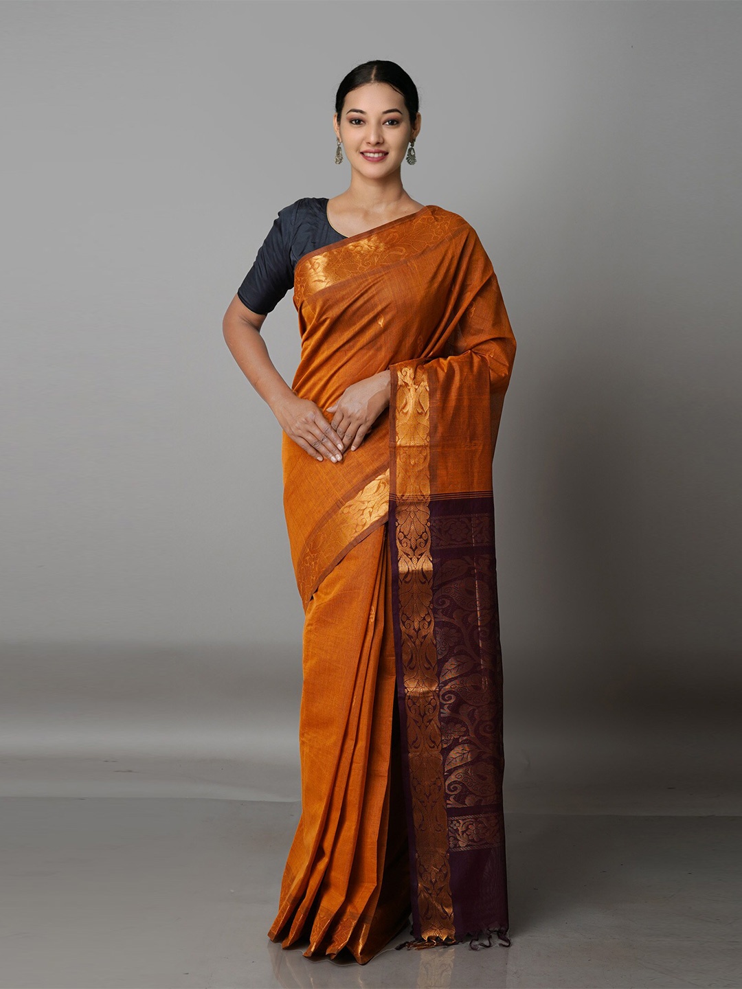 

Unnati Silks Orange & Brown Ethnic Motifs Zari Pure Cotton Gadwal Saree