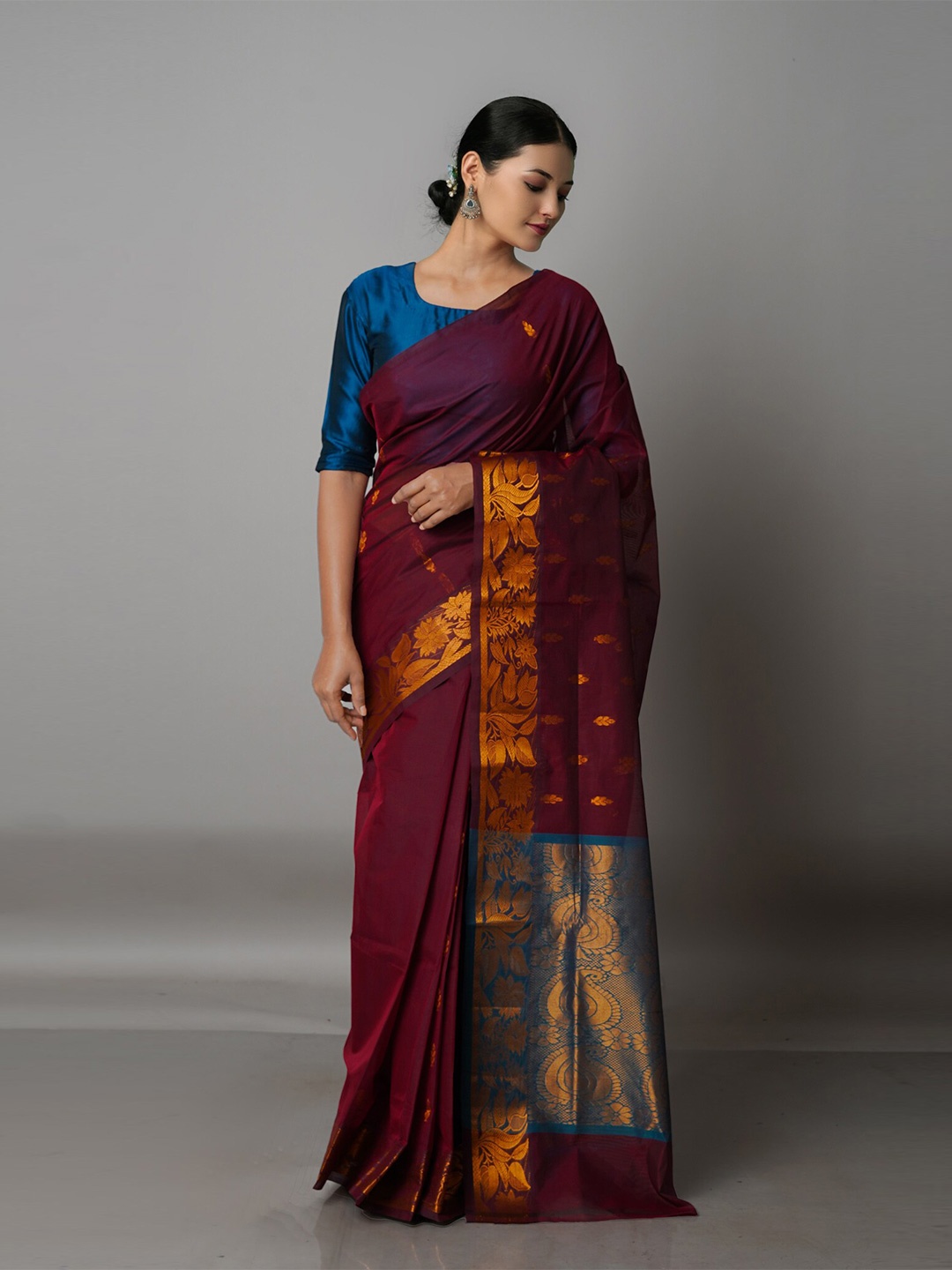 

Unnati Silks Maroon & Blue Floral Zari Pure Cotton Gadwal Saree