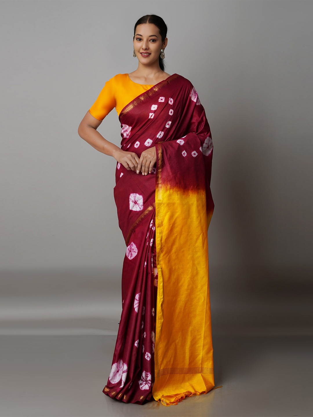 

Unnati Silks Maroon & Yellow Bandhani Zari Silk Cotton Chanderi Saree