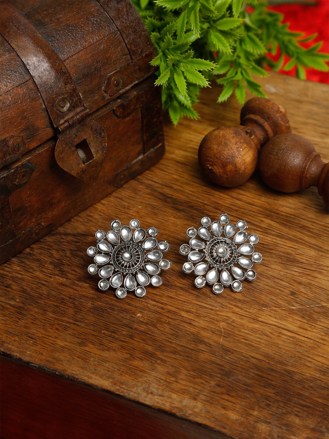 

Dhrohar Silver-Plated Contemporary Studs Earrings