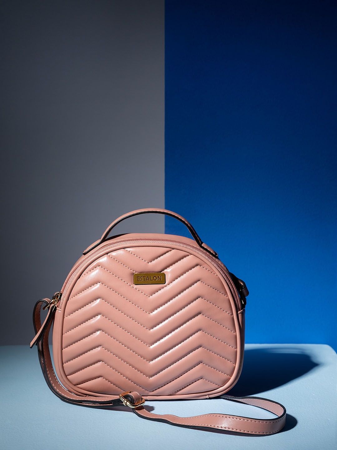 

ESTALON Peach-Coloured Structured Round Sling Bag with Chevron Quilted