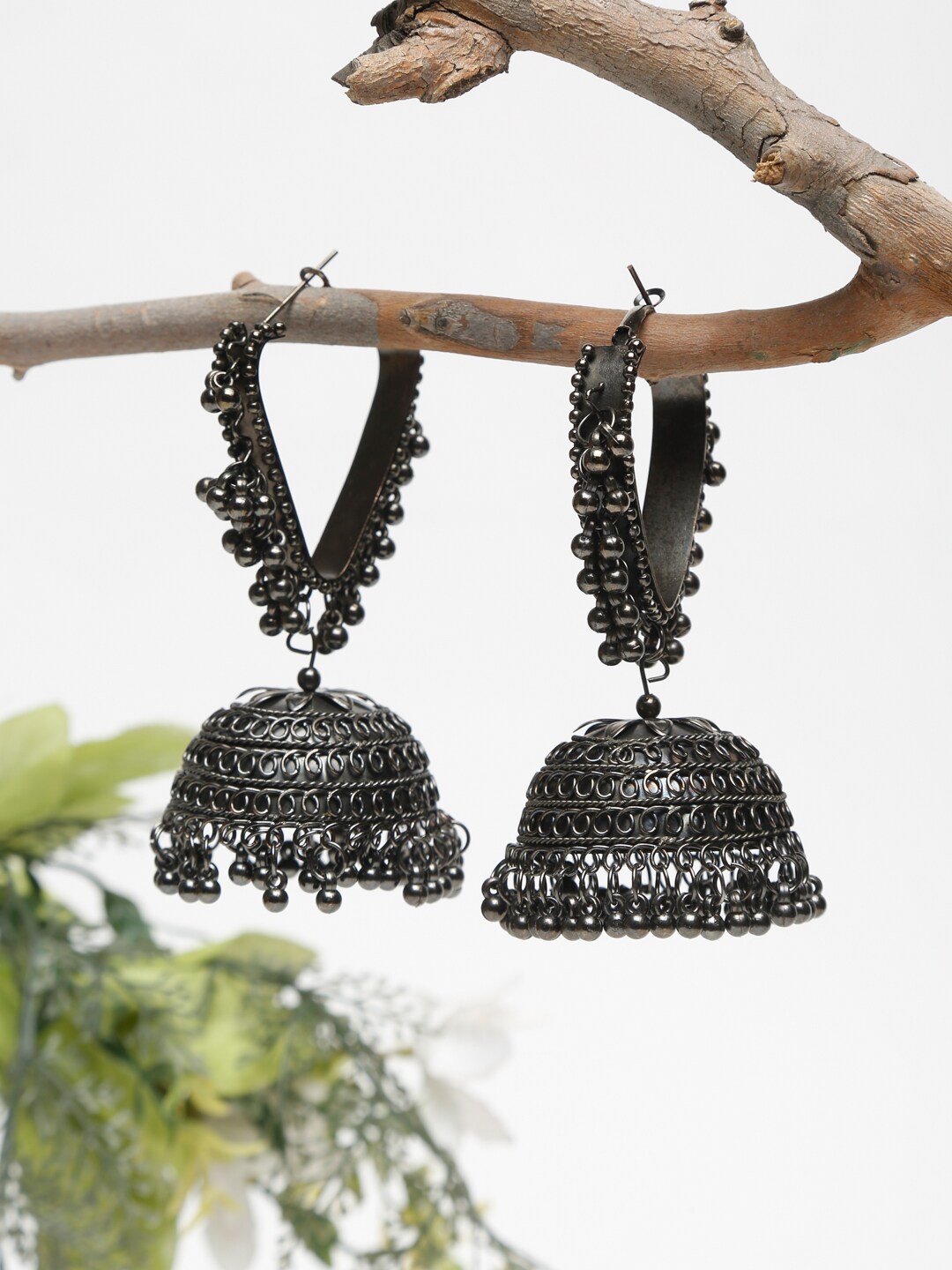 

Dhrohar Black Silver-Plated Oxidised Contemporary Jhumkas Earrings