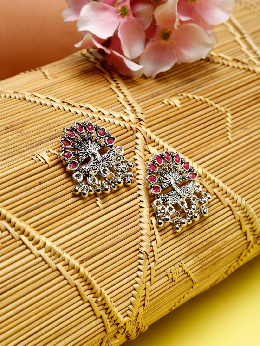 

Dhrohar Pink & Silver-Plated Peacock Shaped Drop Earrings