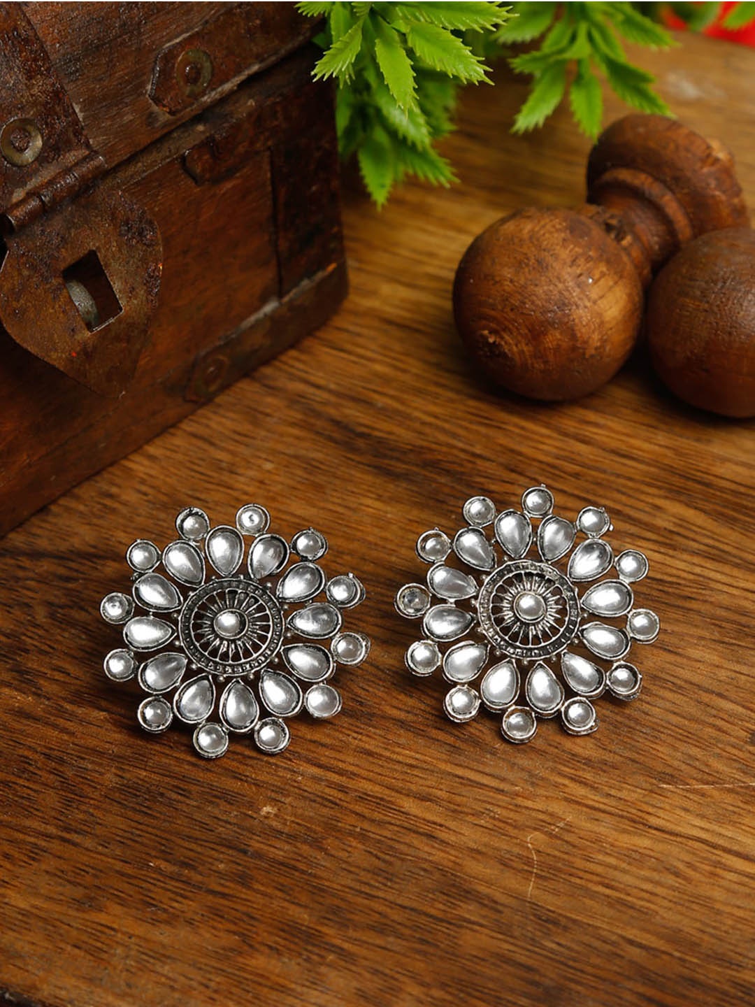 

Dhrohar White & Silver-Plated Oxidised Floral Studs Earrings