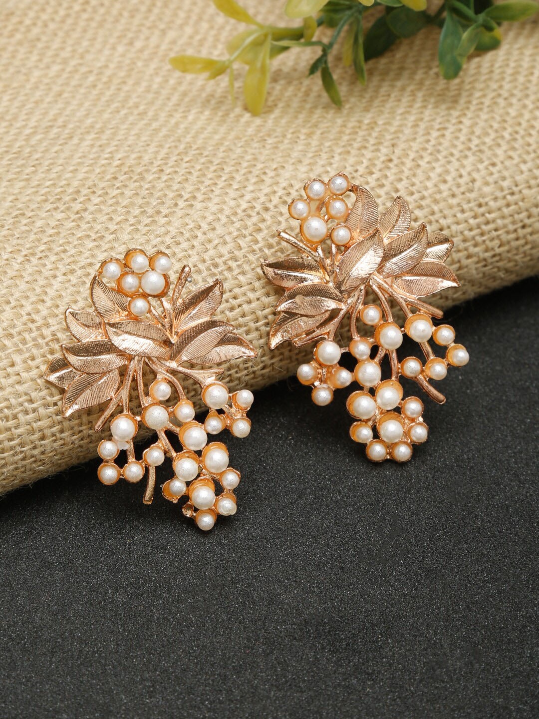 

Dhrohar White & Gold-Plated Contemporary Studs Earrings