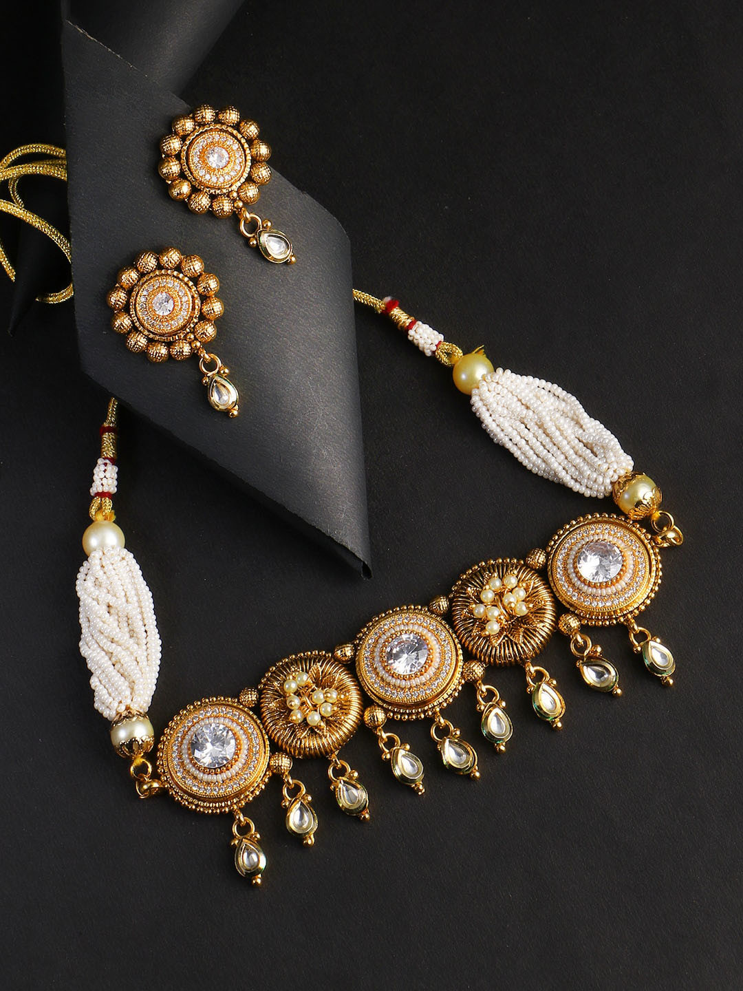 

Adwitiya Collection Gold-Plated White Artificial Stones and Beads Studded Jewellery Set