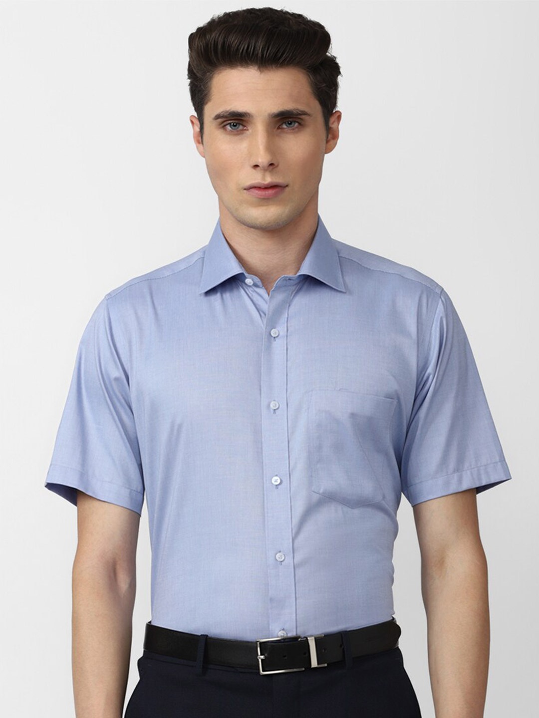 

Van Heusen Men Blue Pure Cotton Solid Formal Shirt