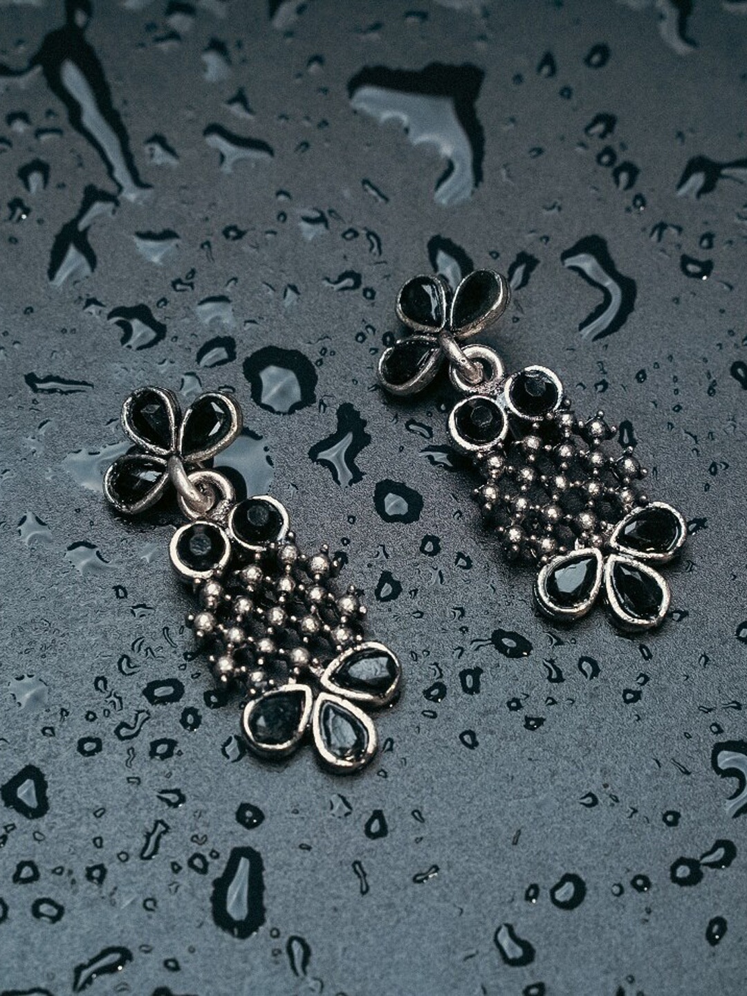 

Indi INSIDE Black & Silver-Plated Floral Oxidised Drop Earrings