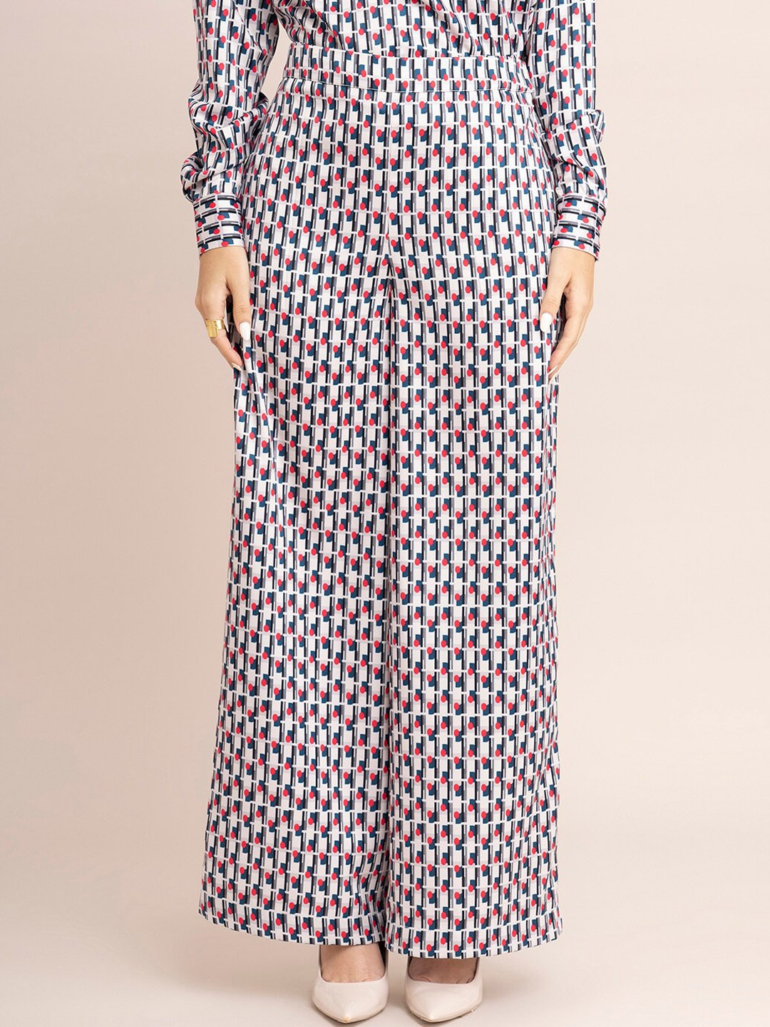 

FableStreet Women White Printed Flared Trousers