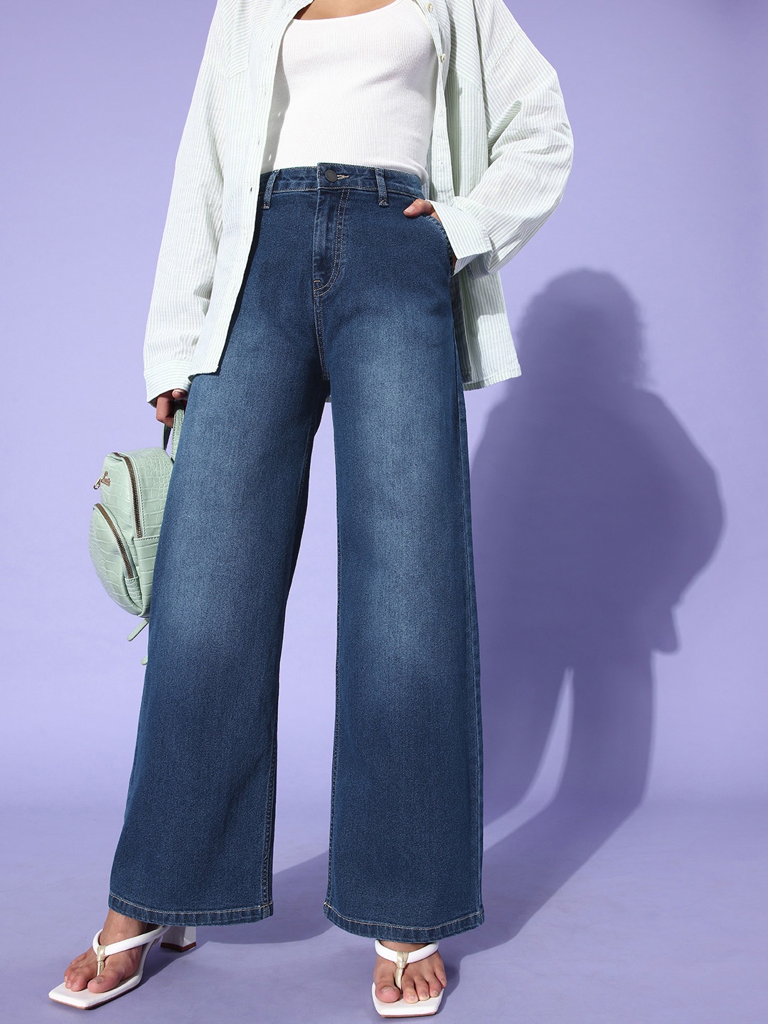 

DressBerry Women Deep Blue Flared Light Fade Stretchable Extra Room Denims Jeans