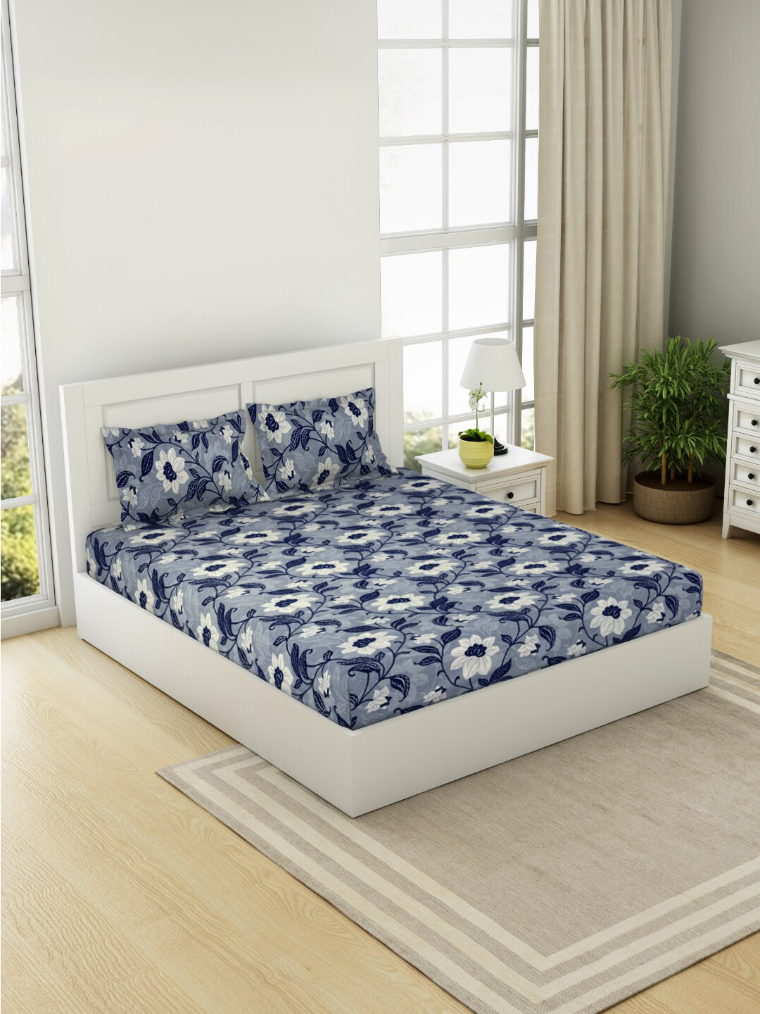 

Welspun Blue & White Floral 144 TC Cotton Queen Bedsheet with 2 Pillow Covers