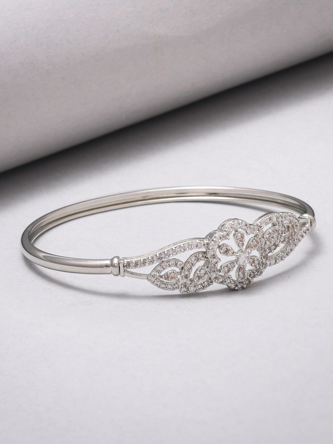 

Voylla Women Silver-Toned Brass Rhodium-Plated Bangle-Style Bracelet