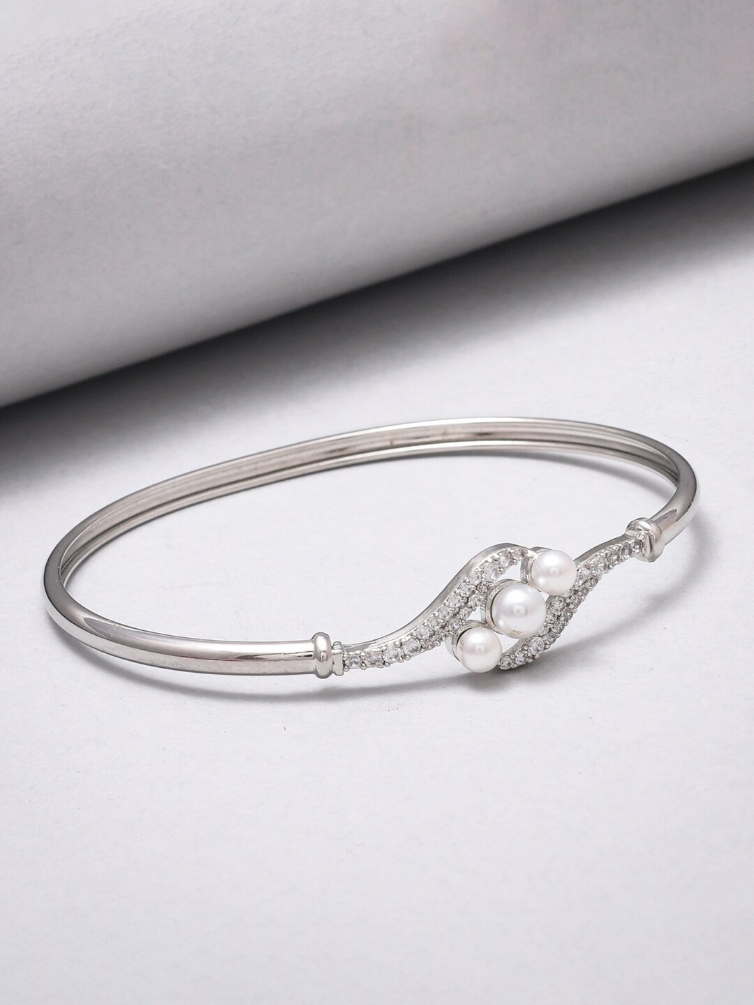 

Voylla Women Silver-Toned & White Brass Rhodium-Plated Bangle-Style Bracelet