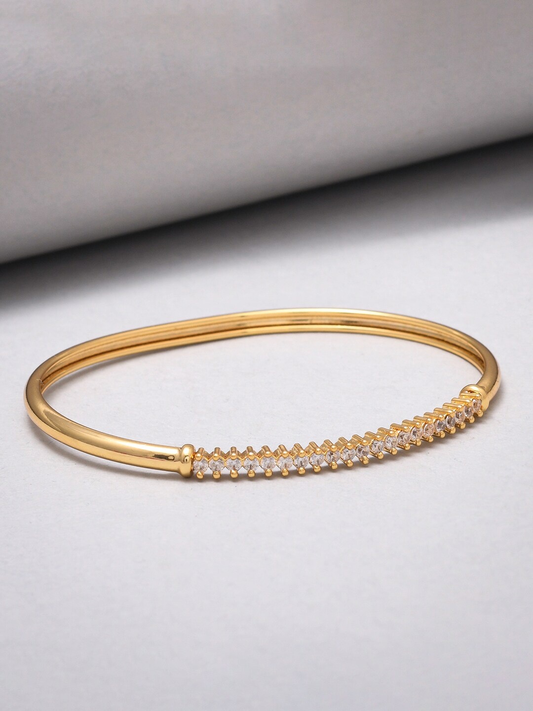 

Voylla Women Gold-Toned & White Brass Gold-Plated Bangle-Style Bracelet
