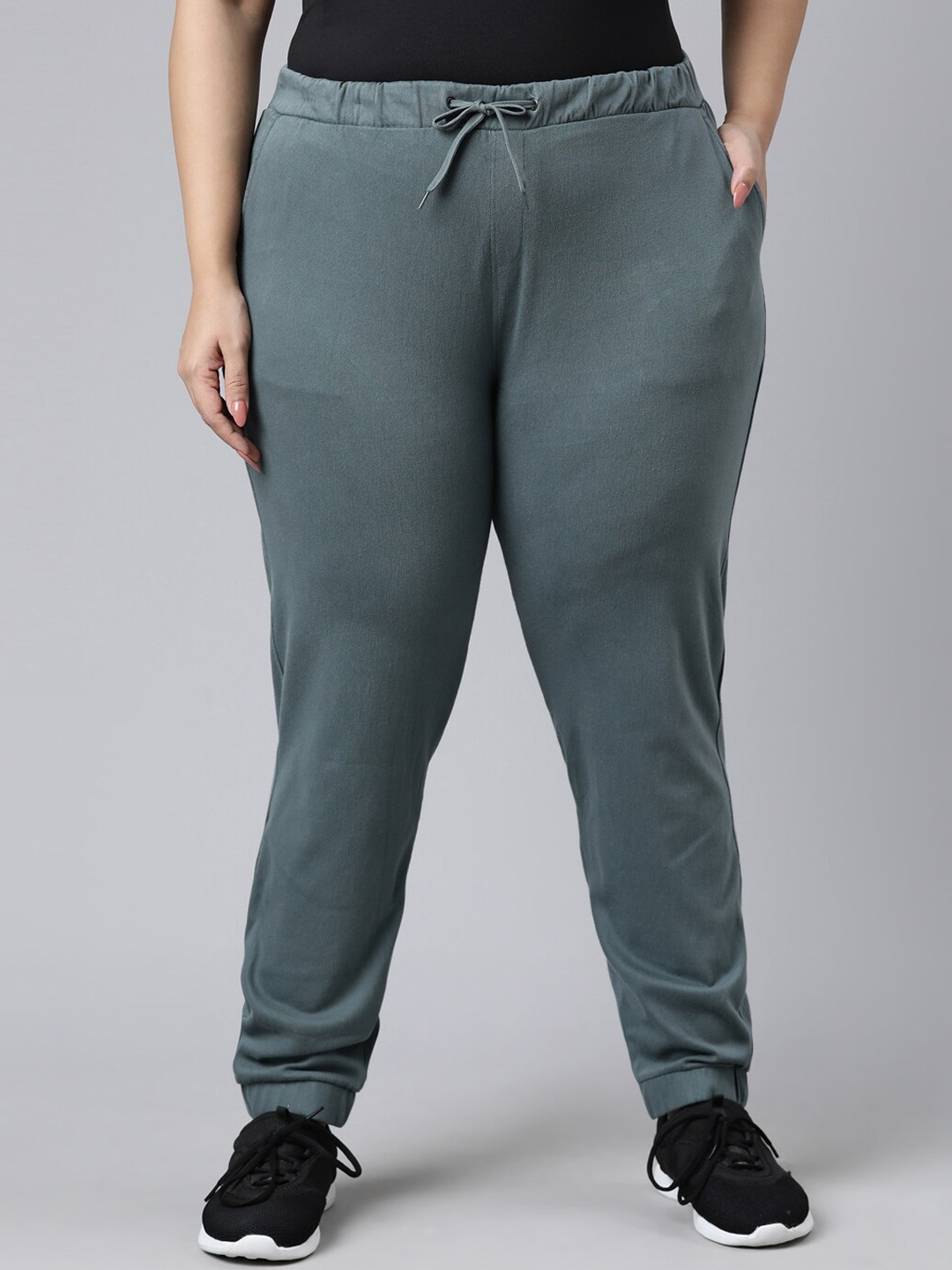 

Go Colors Women Plus Size Green Solid Joggers