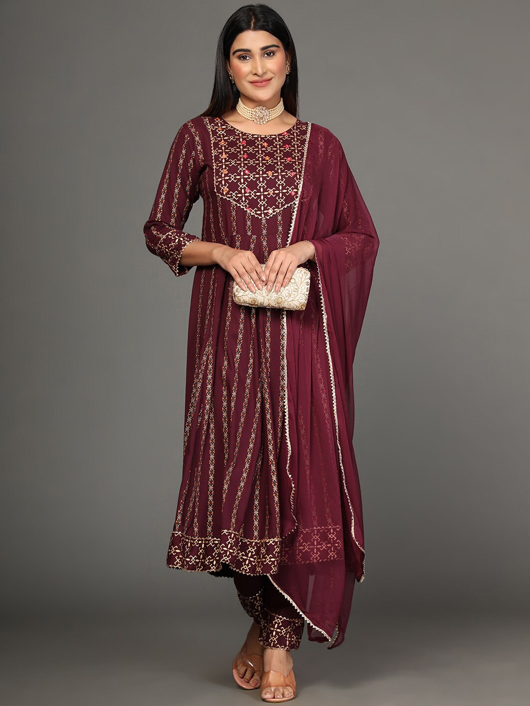 

Ziva Fashion Women Brown Floral Printed Kurta with Trousers & Dupatta