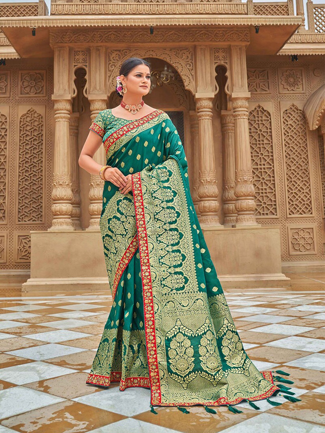 

MONJOLIKA FASHION Teal & Gold-Toned Ethnic Motifs Zari Banarasi Saree