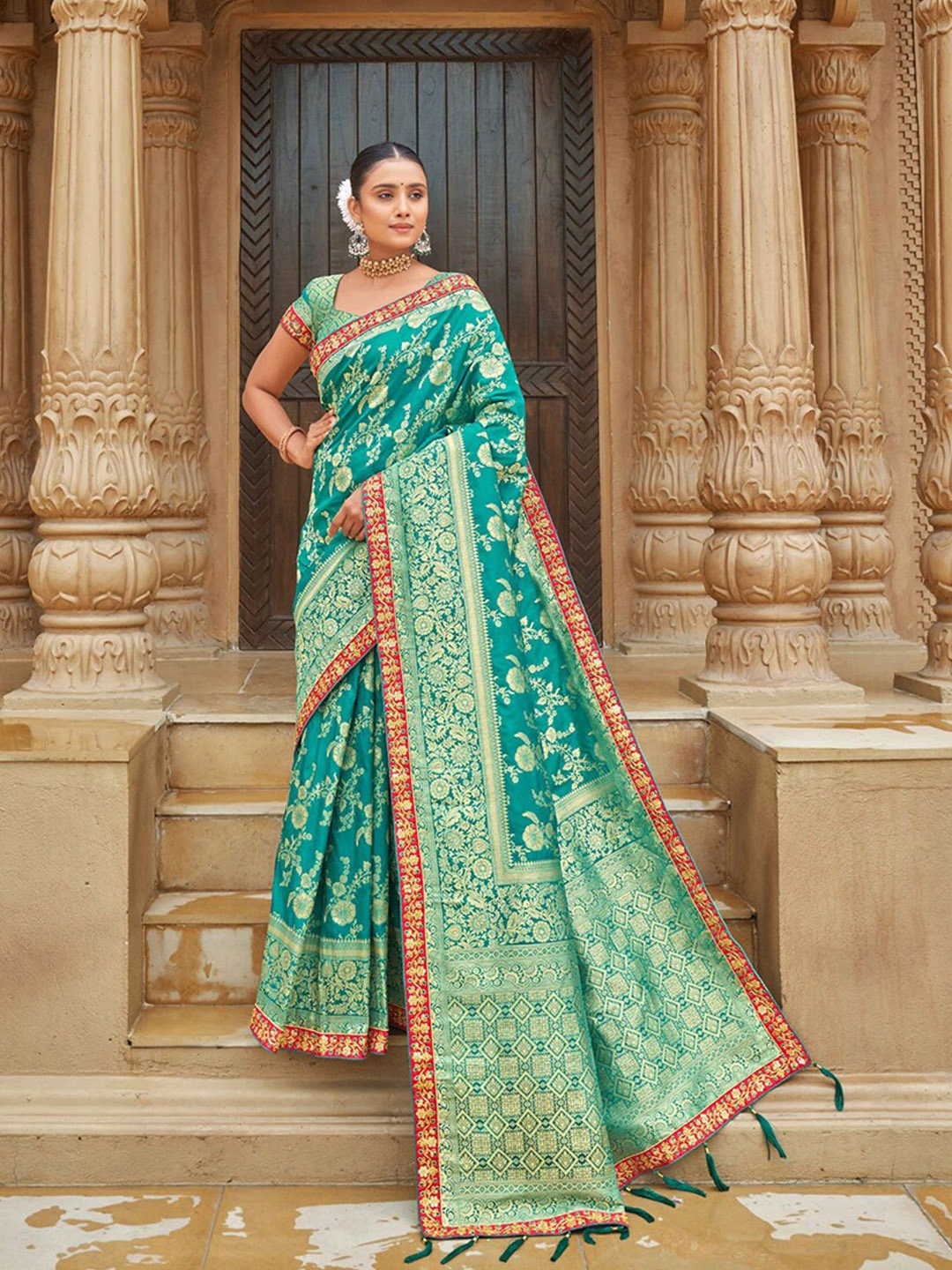 

MONJOLIKA FASHION Turquoise Blue & Gold-Toned Ethnic Motifs Zari Banarasi Saree