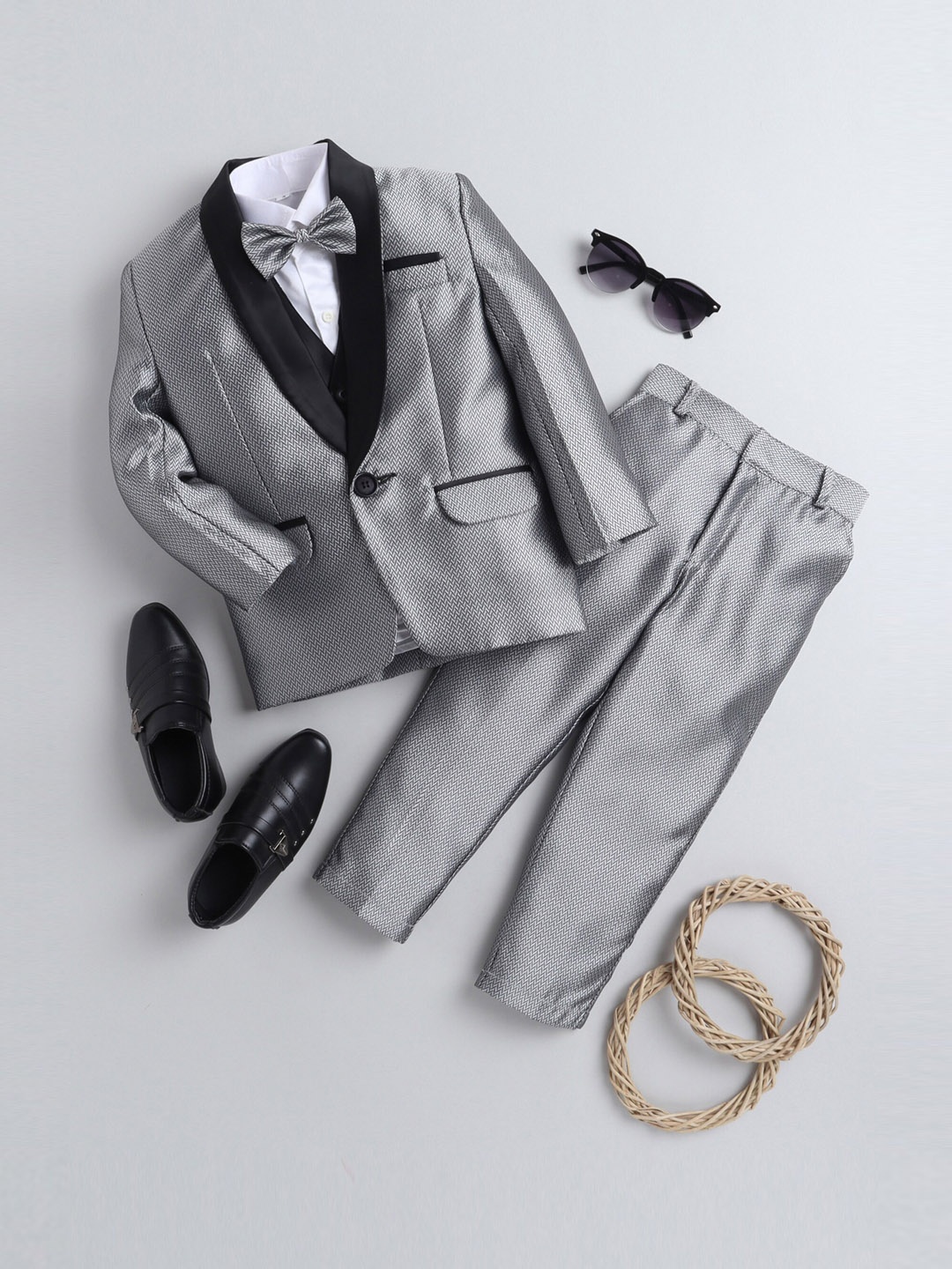 

Jeetethnics BoysGrey & Black Self-Design 4 Piece Tuxedo Suit With Bow, Grey