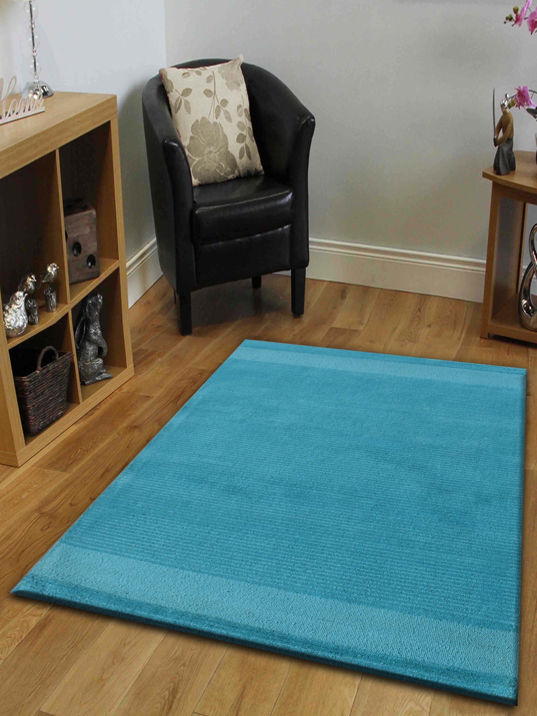 

PRESTO Blue Solid Hand Tufted Wool Carpet
