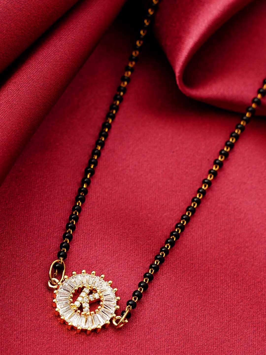

Ferosh Black & White Gold-Plated Stone Studded & Beaded K Alphabet Mangalsutra