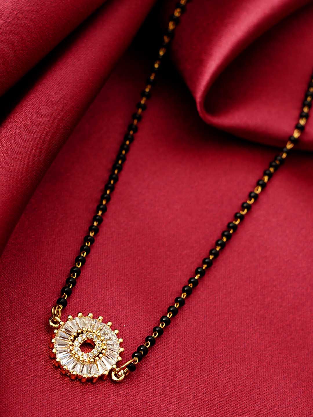 

Ferosh Black & White Gold-Plated Stone Studded & Beaded O Alphabet Mangalsutra