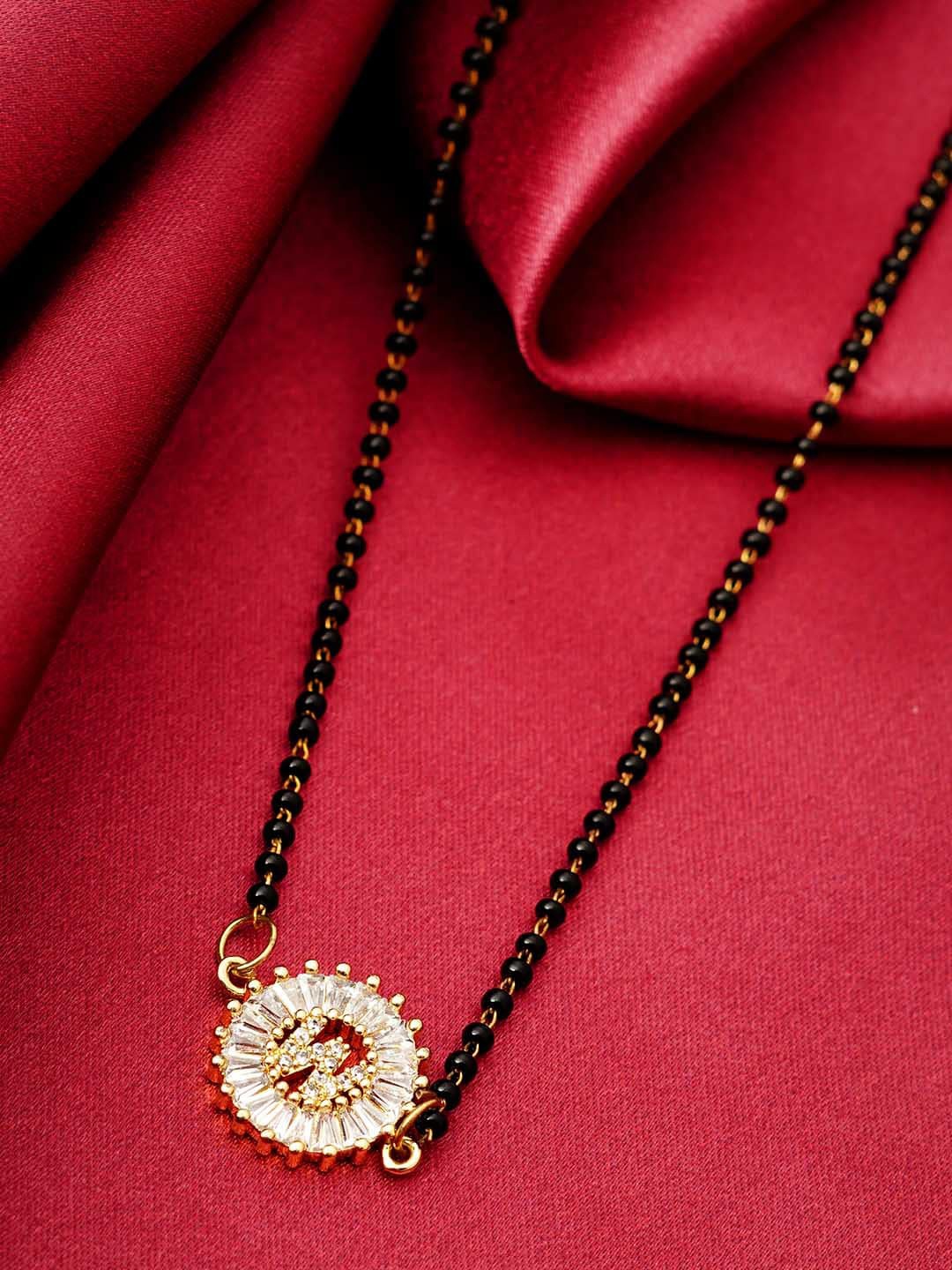 

Ferosh Black & White Gold-Plated Stone Studded & Beaded W Alphabet Mangalsutra