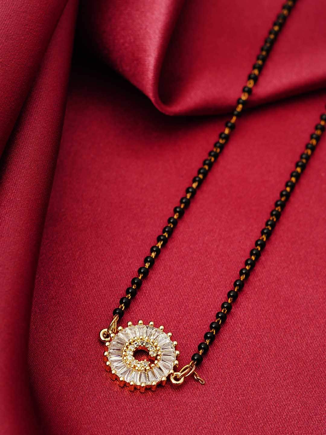 

Ferosh Black & White Gold-Plated Stone Studded & Beaded C Alphabet Mangalsutra