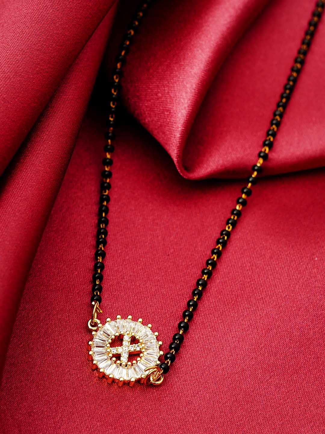 

Ferosh Black & White Gold-Plated Stone Studded & Beaded X Alphabet Mangalsutra