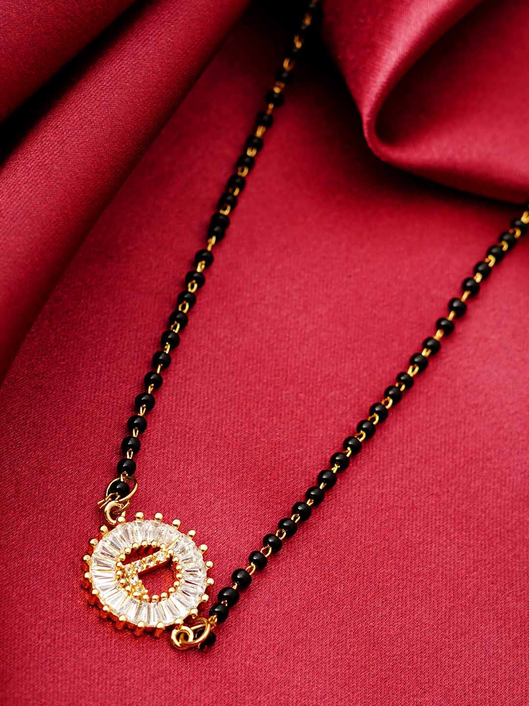 

Ferosh Black & White Gold-Plated Stone Studded & Beaded L Alphabet Mangalsutra