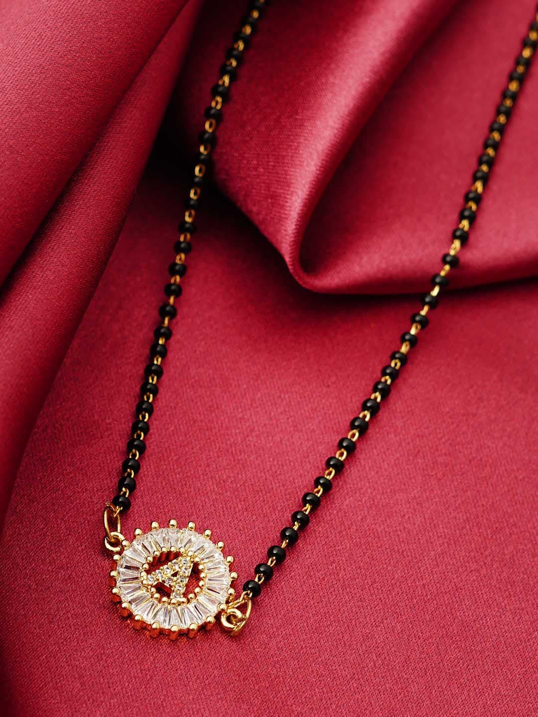 

Ferosh Black & White Gold-Plated Stone Studded & Beaded A Alphabet Mangalsutra